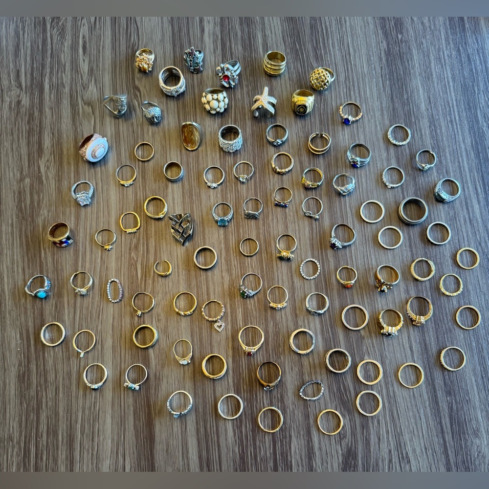 Lot of 85 Assorted Gold and Silver Rings